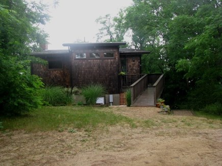Wellfleet Cape Cod vacation rental - View of backside of house, with gently sloping ramp.