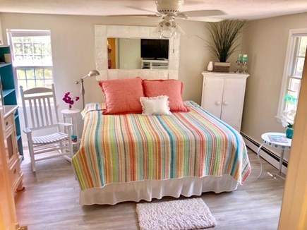 Cotuit /Mashpee line south of  Cape Cod vacation rental - Sunny bright cozy king bedroom over looking landscapes and deck.