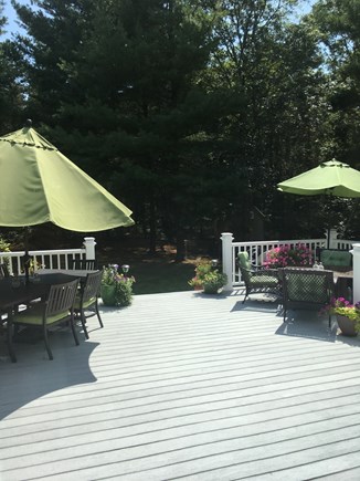 Cotuit /Mashpee line south of  Cape Cod vacation rental - Sunny deck with shaded umbrellas