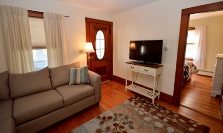 Brewster Cape Cod vacation rental - Comfy living area with flat screen TV, access to enclosed front p