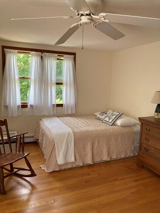 Eastham, walk to Great Pond Cape Cod vacation rental - 2nd floor bedroom with double bed overlooks back yard