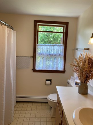 Eastham, walk to Great Pond Cape Cod vacation rental - Second floor bathroom with tub, between the upstairs bedrooms