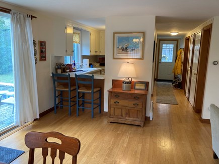 Eastham, walk to Great Pond Cape Cod vacation rental - View from dining room to kitchen and back deck
