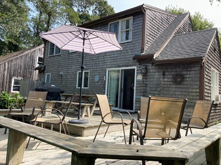 Eastham, walk to Great Pond Cape Cod vacation rental - Deck with private, level back yard