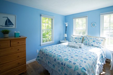 Harwich Cape Cod vacation rental - 1st floor bedroom with queen and wall mounted smart tv