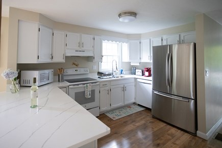 Harwich Cape Cod vacation rental - Kitchen cabinets are stocked with all the essentials.