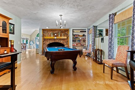 Brewster Cape Cod vacation rental - Pool table and game room off the kitchen.