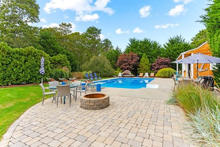 Brewster Cape Cod vacation rental - Patio off the pool features a wood burning fire-pit.