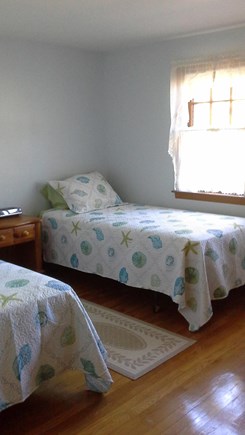 South Dennis Cape Cod vacation rental - Bedroom with a pair of twin beds.