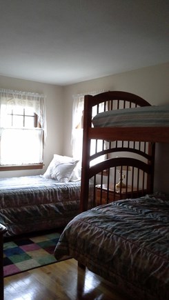 South Dennis Cape Cod vacation rental - Bedroom with a full size and twin bunk and another twin.