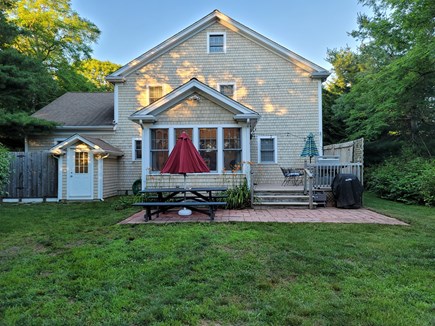 Brewster Cape Cod vacation rental - Back Patio and Deck, gas grill and wood grill for smores and more