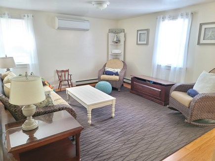Brewster Cape Cod vacation rental - Sitting room is open to kitchen and dinning, with toy box
