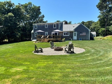 Harwich Cape Cod vacation rental - Great backyard fun with a new large deck and firepit!