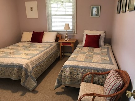 Truro Cape Cod vacation rental - First floor bedroom with double and twin beds.
