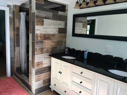 Eastham Cape Cod vacation rental - Large Second Floor Bath—tile, granite, pebbled shower floor...