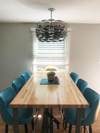 Eastham Cape Cod vacation rental - Eight comfortable stools surround a large butcher block table.