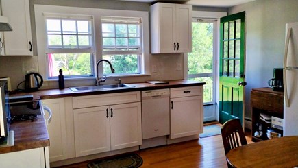 South Harwich Cape Cod vacation rental - Kitchen-3 windows, Door to backyard