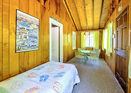 East Sandwich Cape Cod vacation rental - Trundle and game table on sleeping porch.