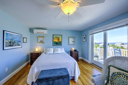 East Sandwich Cape Cod vacation rental - Bedroom four - queen bed - 3rd floor with beautiful views and access to the deck.