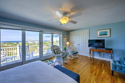 East Sandwich Cape Cod vacation rental - Bedroom four - queen bed - 3rd floor with beautiful views and access to the deck.