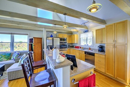 East Sandwich Cape Cod vacation rental - Open concept kitchen with living room and dining room.
