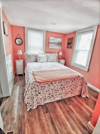 South yarmouth Cape Cod vacation rental - Queen bed with drawers & closet w/ mounted 30 inch tv.