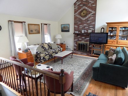 near South & West Chatham line Cape Cod vacation rental - Open living room with cathedral ceiling