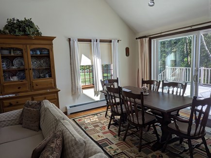 near South & West Chatham line Cape Cod vacation rental - Vaulted dining/living area, open to kitchen, 8-ft slider to deck.