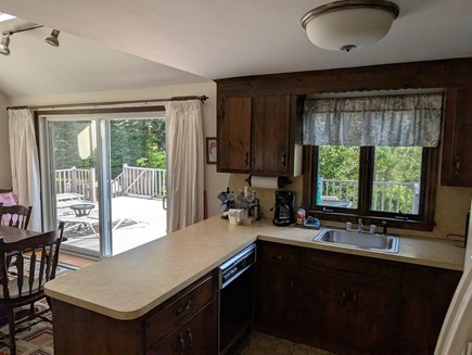 near South & West Chatham line Cape Cod vacation rental - Well-equipped kitchen.  Peninsula divides to dining room.