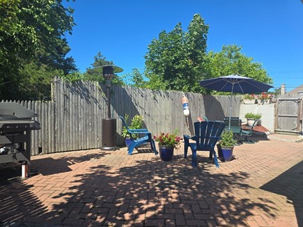 Dennis Port Cape Cod vacation rental - Cottage: Very Private patio. Hot shower. Cozy dining area. Grill
