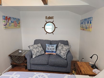 Dennis Port Cape Cod vacation rental - Cottage: Sitting area inside bedroom, Air conditioned and fan