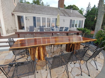 North Chatham Cape Cod vacation rental - New (2022) 12 person live edge outdoor dining table on the patio