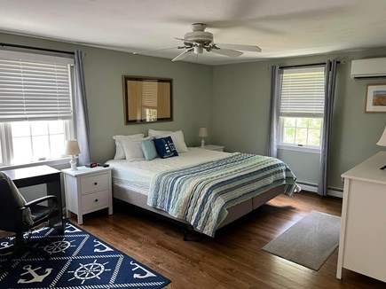 Brewster Cape Cod vacation rental - King size bed with large closets and small desk.