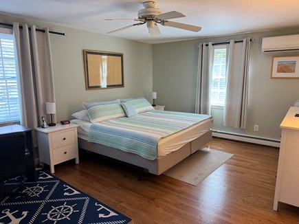 Brewster Cape Cod vacation rental - Upstairs primary bedroom with king bed and AC mini split.