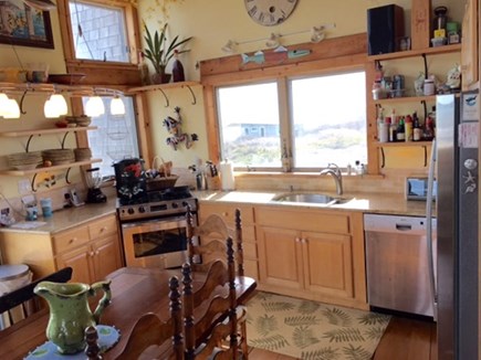 South Wellfleet on the Ocean Cape Cod vacation rental - Kitchen with dishwasher and stainless steel frig,