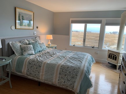 North Eastham Cape Cod vacation rental - Master bedroom with a/c and gas fireplace