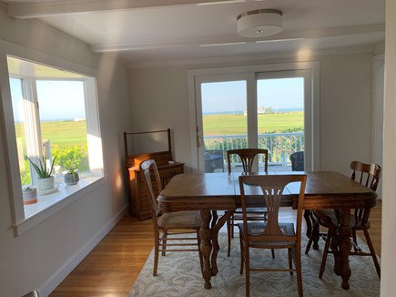 North Eastham Cape Cod vacation rental - Dining room with view of deck and marsh