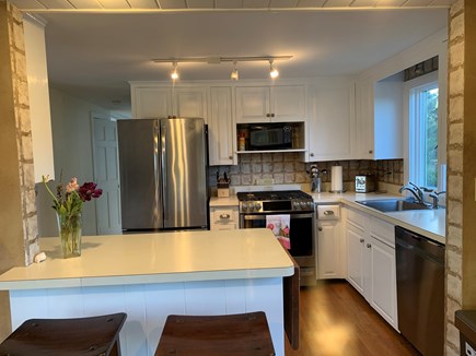 North Eastham Cape Cod vacation rental - Kitchen island off of sunroom