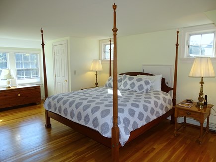 Orleans, Grandview Cape Cod vacation rental - Upstairs 4-poster King Bedroom with smart TV, great views west.