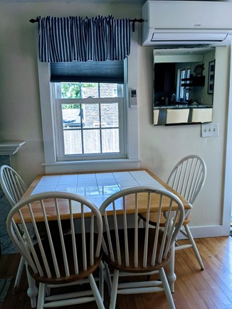 Harwich Cape Cod vacation rental - Small table with four chairs. Split ac wall unit.