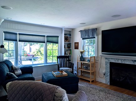 Harwich Cape Cod vacation rental - Living room with a recliner, chair, small couch and tv!