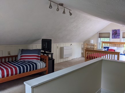 Harwich Cape Cod vacation rental - Loft with twin bed, full bed and a TV with split ac wall unit.