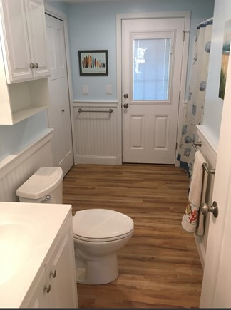 Eastham Cape Cod vacation rental - Updated bathroom with washer/dryer combo and shower/tub combo.