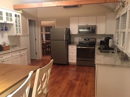 Eastham Cape Cod vacation rental - Kitchen update in 2018: new stove, fridge, sink, granite counter!