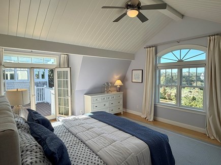 East Orleans Cape Cod vacation rental - Master bedroom with French doors to upper deck