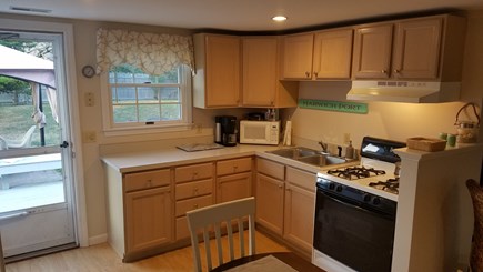 Harwich Port, Red River Beach Cape Cod vacation rental - Updated kitchen with stove, microwave, coffee pot, and essentials