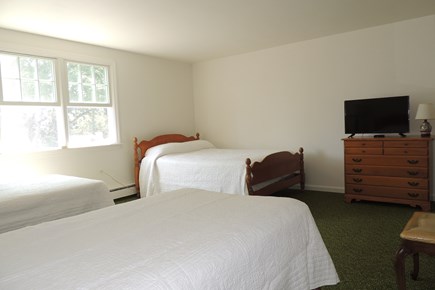 Harwich Port Cape Cod vacation rental - Second floor bedroom with 1 full & two twin beds