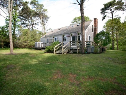 Brewster Cape Cod vacation rental - Back of home with deck and outdoor shower