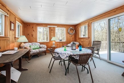 Falmouth, Old Silver Beach Cape Cod vacation rental - Sun Room off of the dining room.  Perfect spot to enjoy a coffee.