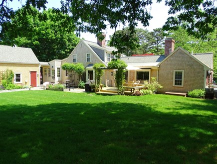 Yarmouth Port Cape Cod vacation rental - Large back yard – with several seating areas, gardens